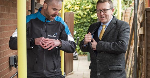 A Midland Heart employee with someone from British Gas