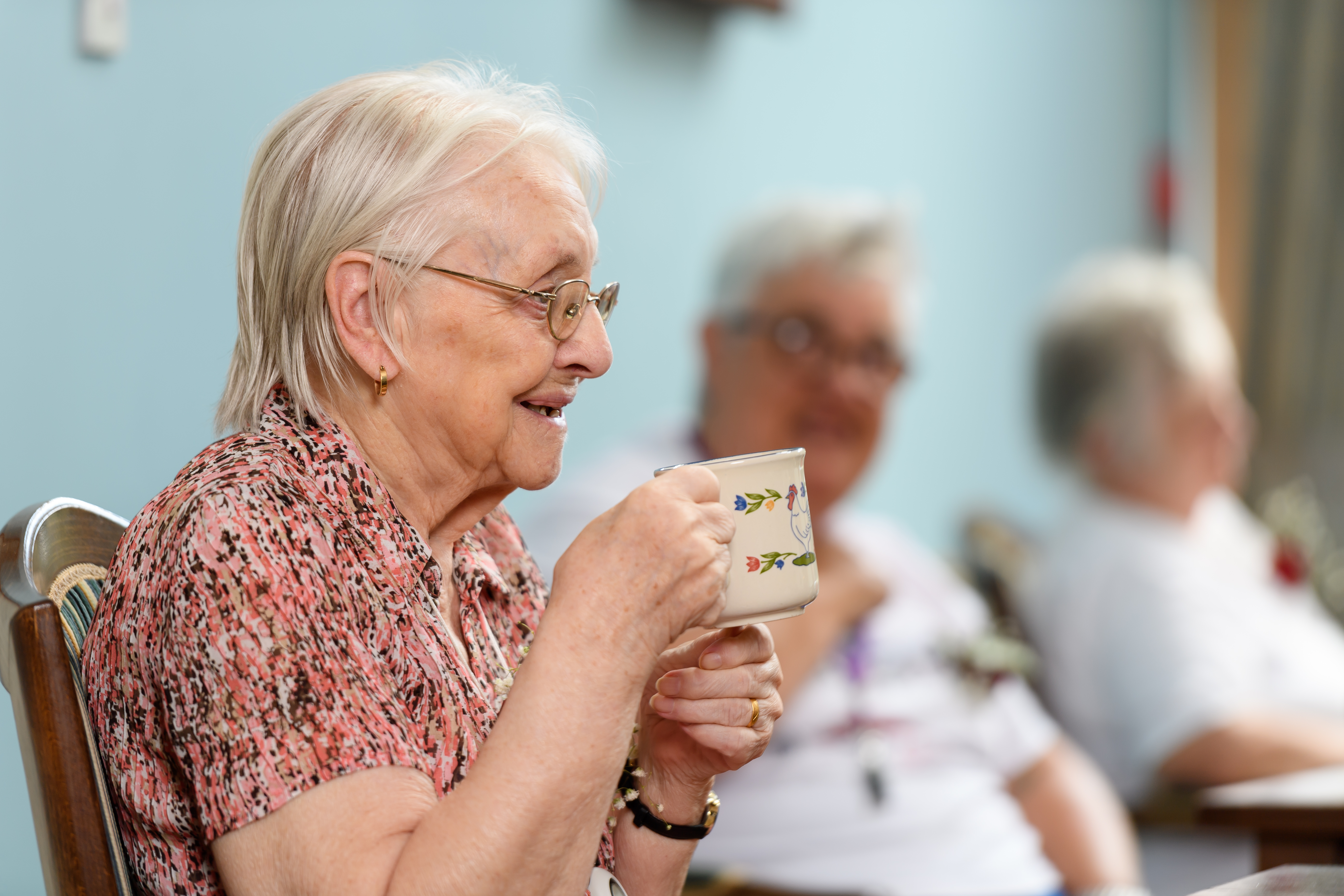 A tenant with a drink at Princethorpe Court