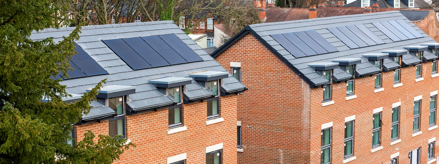 Solar panels on the roofs of the houses