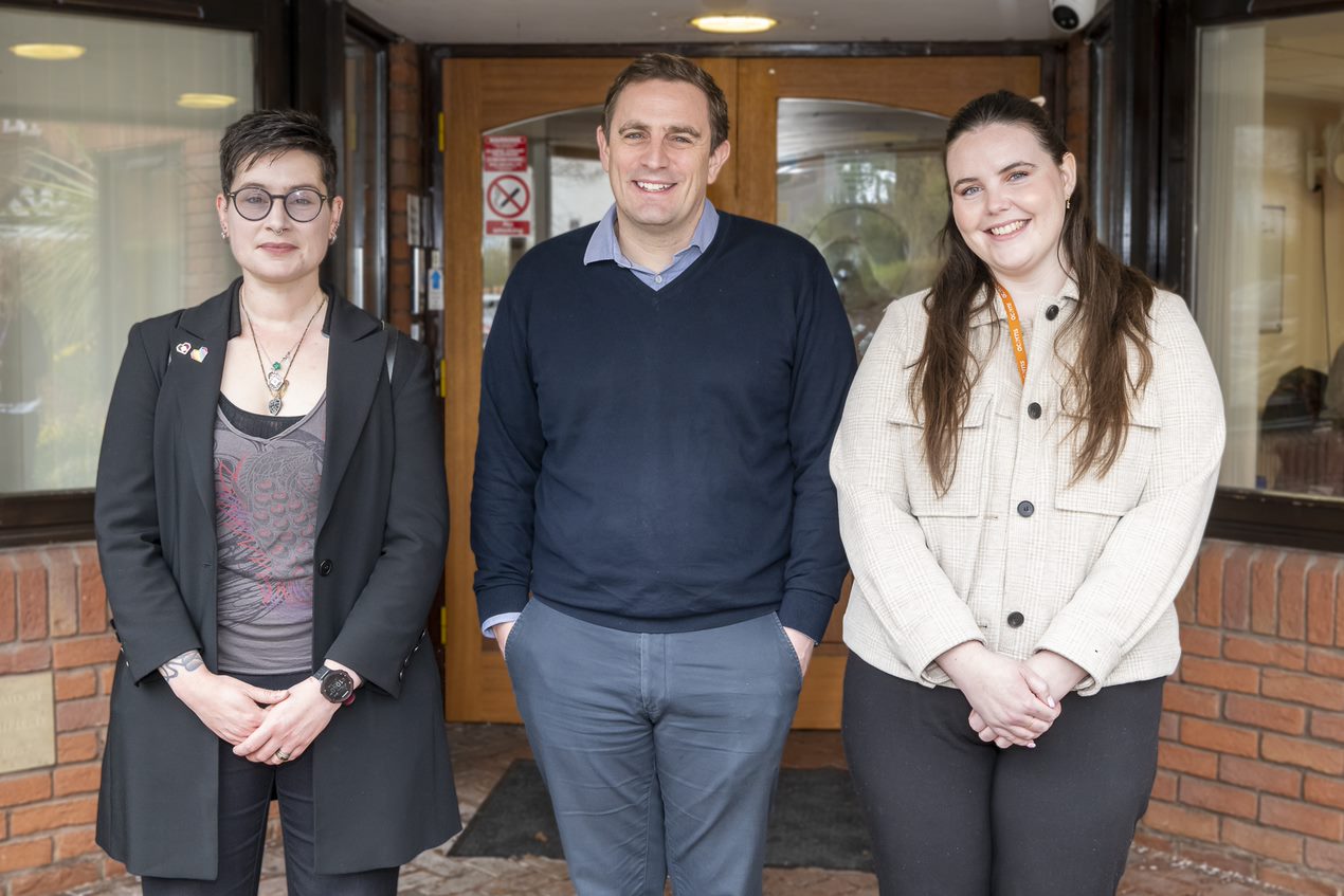2 Midland Heart employees standing with an Acorns employee
