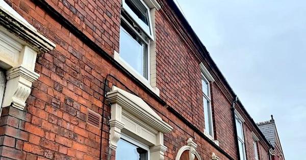 Angled shot looking up at terraced houses