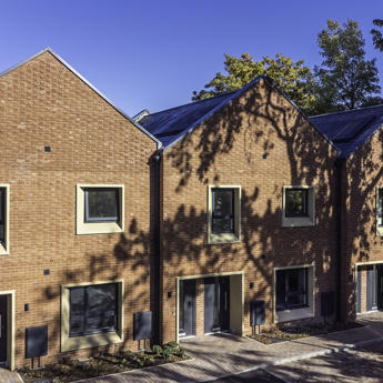 Front of Elvetham homes in the sunshine